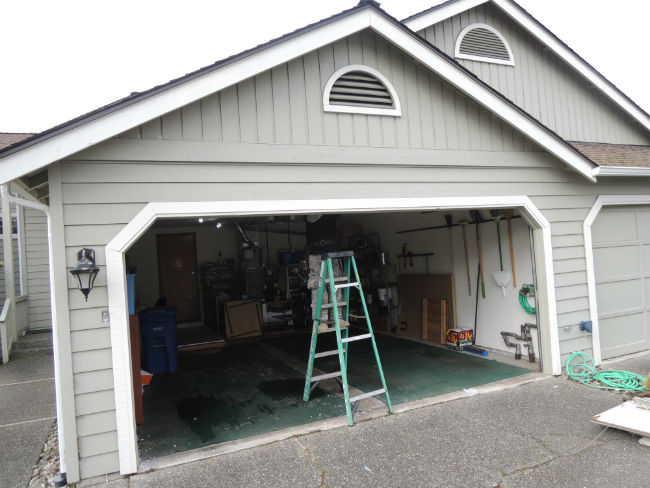 Garage Door Bent Panel Repair In Hamtramck MI By Elite® Garage Door, Repair & Installation Services